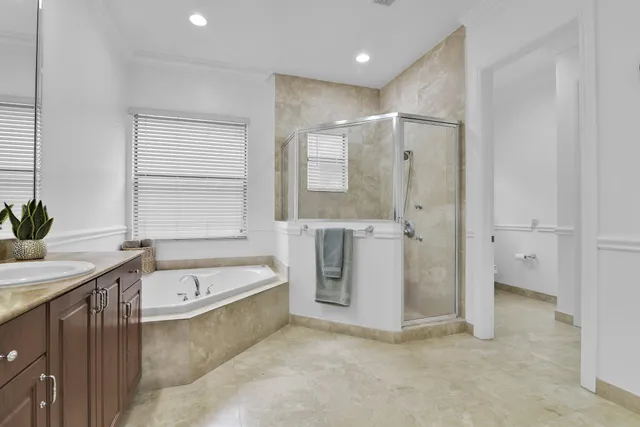 $10,000 | 10703 Versailles Boulevard, Wellington, FL 33449