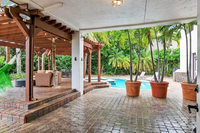 $10,000 | 10703 Versailles Boulevard, Wellington, FL 33449