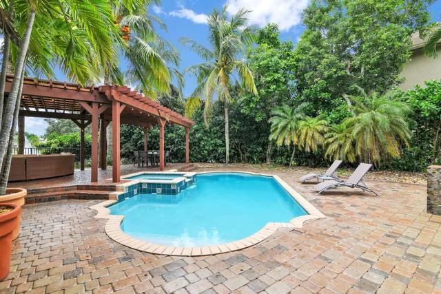 $10,000 | 10703 Versailles Boulevard, Wellington, FL 33449