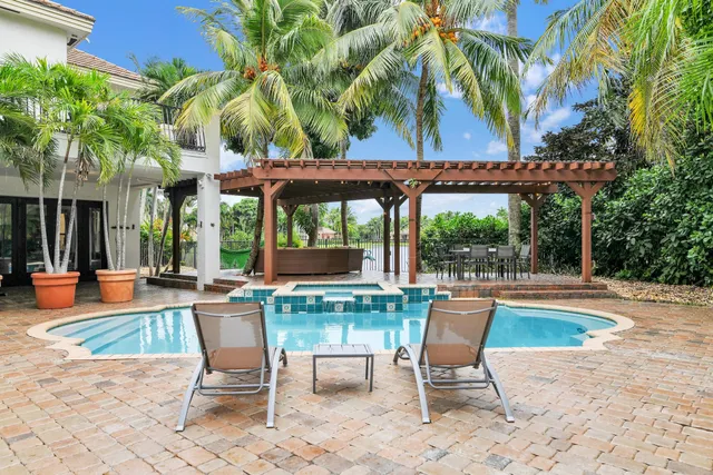 $10,000 | 10703 Versailles Boulevard, Wellington, FL 33449