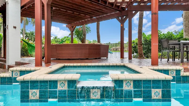 $10,000 | 10703 Versailles Boulevard, Wellington, FL 33449