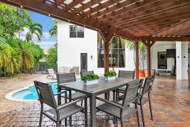 $10,000 | 10703 Versailles Boulevard, Wellington, FL 33449