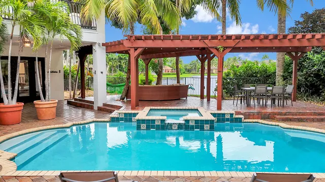 $10,000 | 10703 Versailles Boulevard, Wellington, FL 33449