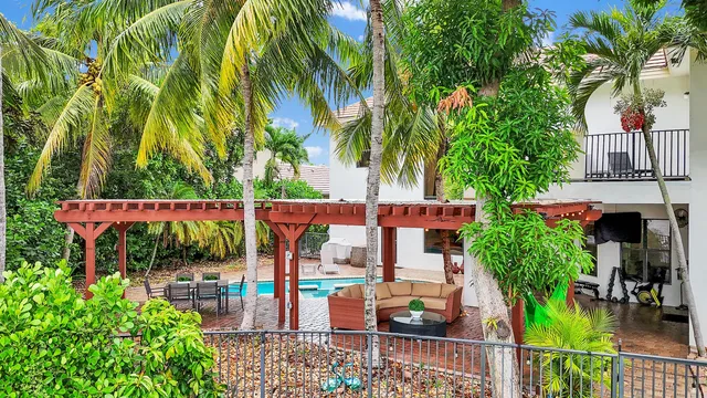 $10,000 | 10703 Versailles Boulevard, Wellington, FL 33449