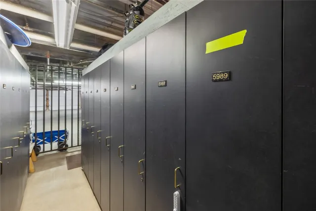 a room with table tennis pool table and windows