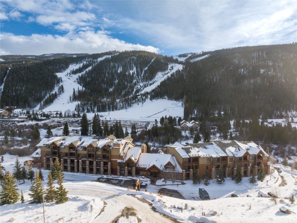 22714 Highway 6, Unit 5989 Keystone, CO 80435 - Photo 3 of 37 a view of a town with mountains in the background