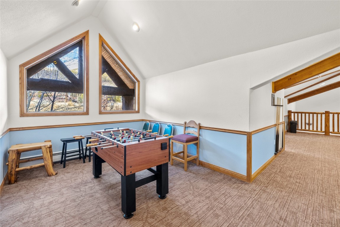 22714 Highway 6, Unit 5989 Keystone, CO 80435 - Photo 32 of 37 a living room with furniture and a window
