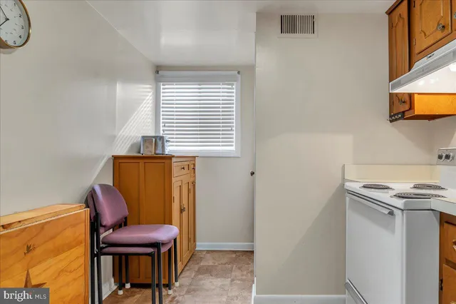 a room with a chair and a couch