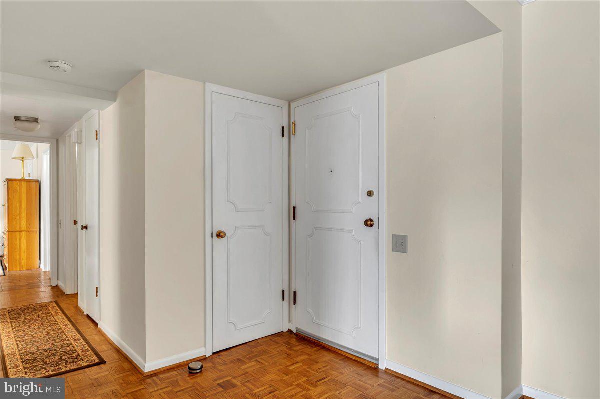 1403 Shallcross Avenue, Unit 310 Wilmington, DE 19806 - Photo 21 of 21 a view of a room with wooden floor and bathroom