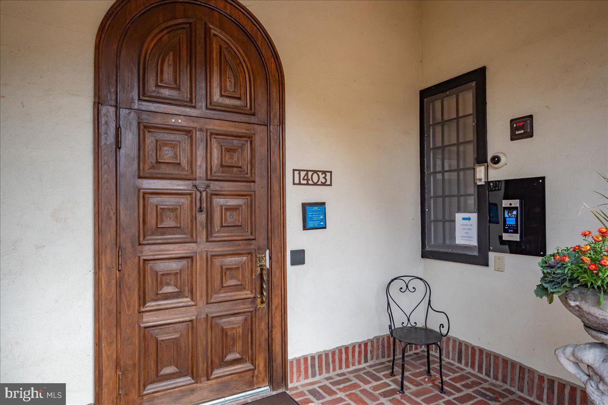 1403 Shallcross Avenue, Unit 310 Wilmington, DE 19806 - Photo 4 of 21 front view of a house with entryway