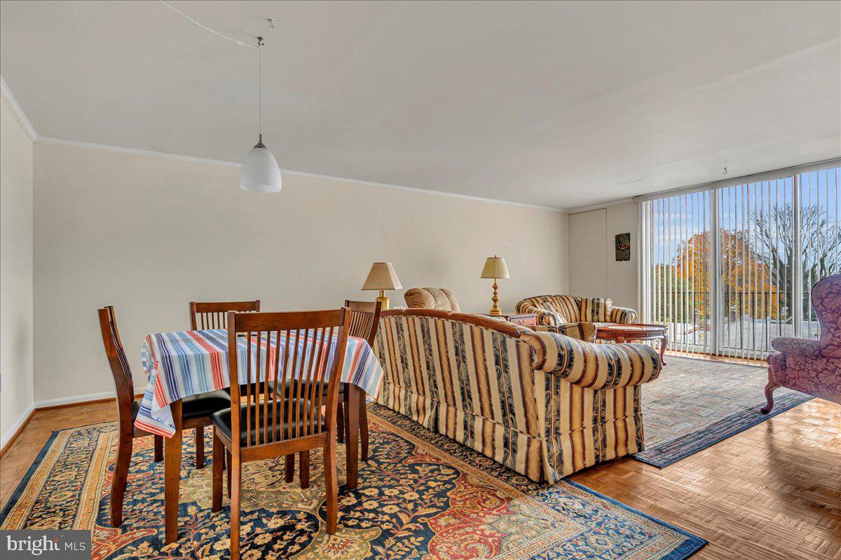 1403 Shallcross Avenue, Unit 310 Wilmington, DE 19806 - Photo 7 of 21 a view of a room with lots of furniture and windows