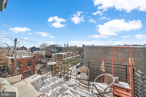 a view of a terrace with furniture