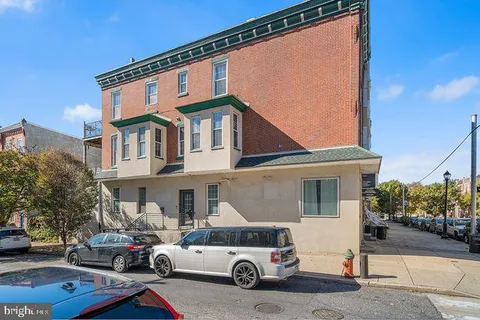 a car parked in front of a house