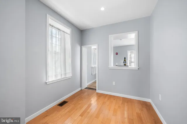 an empty room with windows