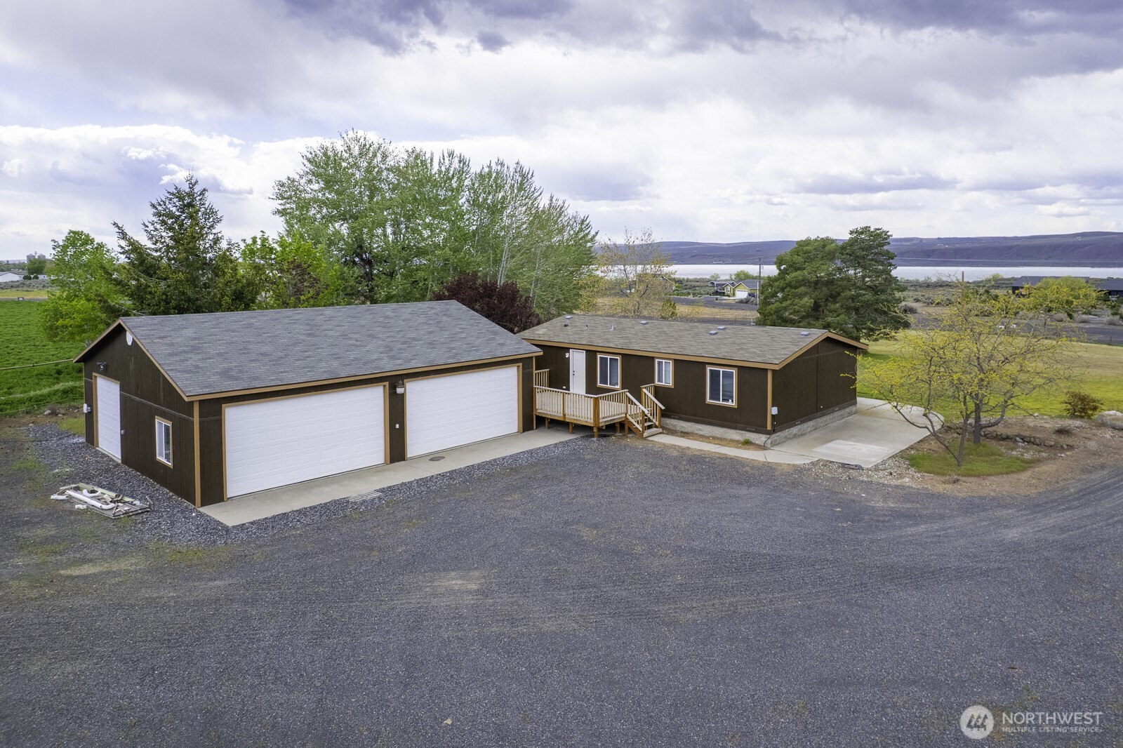 10035 Fordair Road Northeast Coulee City, WA 99115 - Photo 1 of 27 a view of a house with a yard and balcony