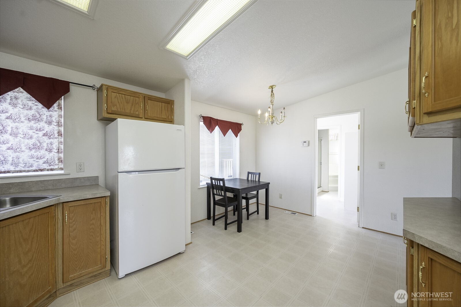 10035 Fordair Road Northeast Coulee City, WA 99115 - Photo 13 of 27 a kitchen with stainless steel appliances granite countertop a refrigerator and a stove top oven
