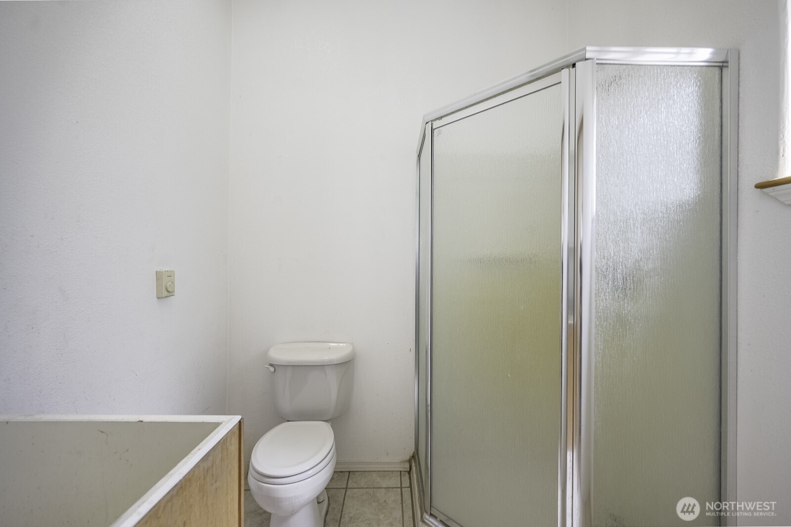 10035 Fordair Road Northeast Coulee City, WA 99115 - Photo 23 of 27 a white toilet sitting next to a shower