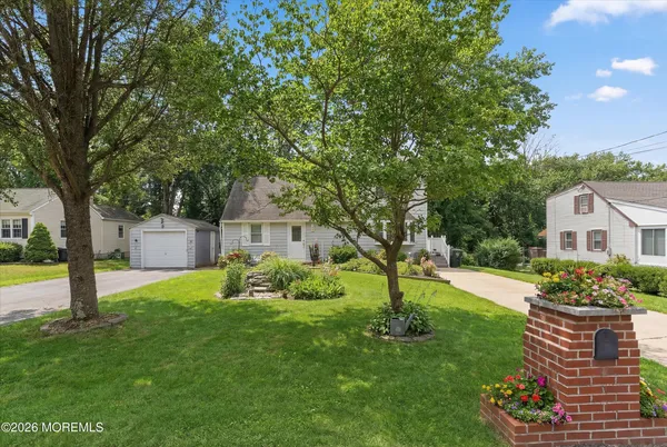 a front view of a house with a garage