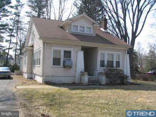 248 Washington Road Princeton, NJ 08540 - Photo 1 of 1 a front view of a house with garden