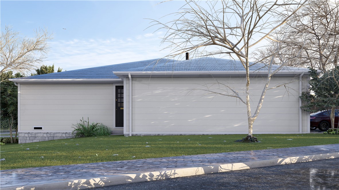 900 Winding Road College Station, TX 77840 - Photo 5 of 6 a front view of a house with garden