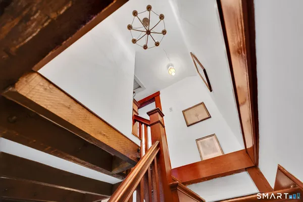 a view of a hallway with a livingroom