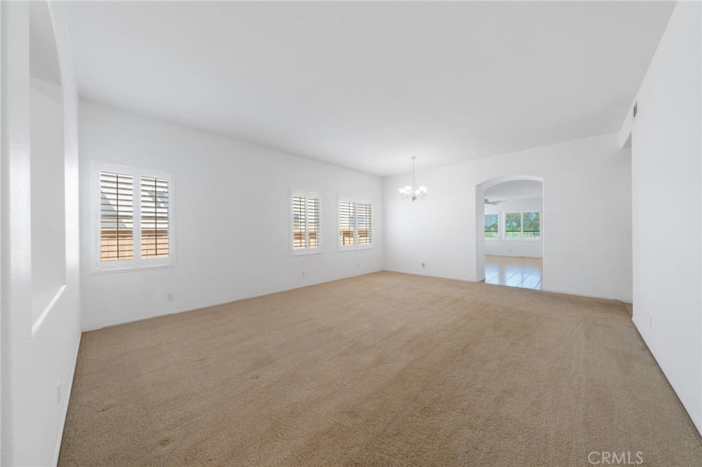 31256 Firestone Street Temecula, CA 92591 - Photo 15 of 56 a view of an empty room with a window