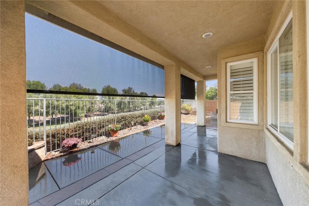 31256 Firestone Street Temecula, CA 92591 - Photo 34 of 56 a living room with blue lights with furniture