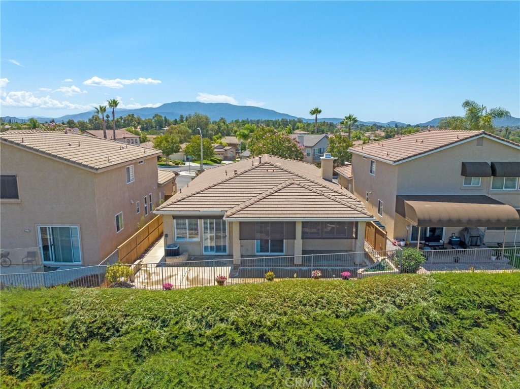 31256 Firestone Street Temecula, CA 92591 - Photo 46 of 56 a front view of a house with a yard
