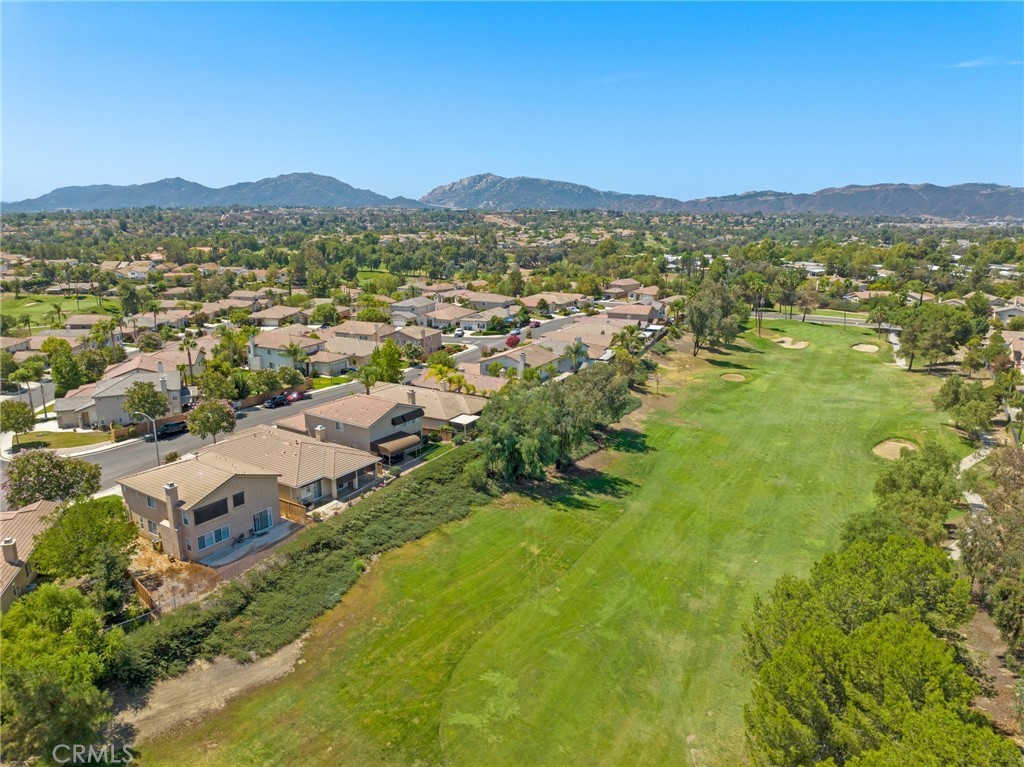 31256 Firestone Street Temecula, CA 92591 - Photo 48 of 56 an aerial view of residential houses with outdoor space and trees