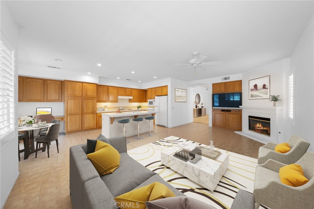31256 Firestone Street Temecula, CA 92591 - Photo 6 of 56 a living room with furniture and a fireplace
