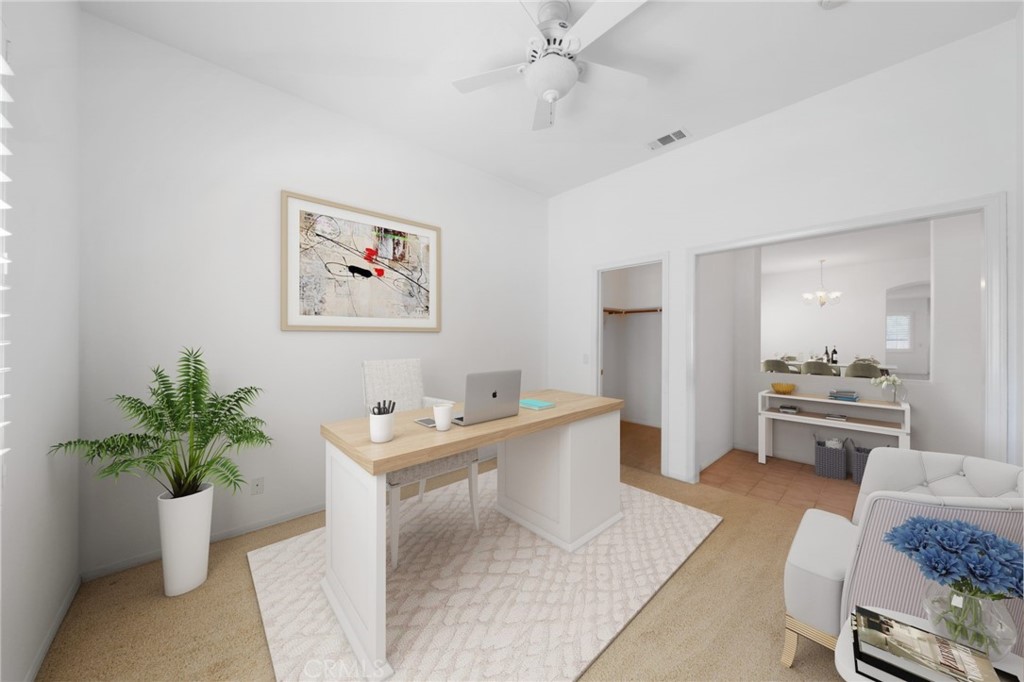 31256 Firestone Street Temecula, CA 92591 - Photo 9 of 56 a living room with furniture and view of kitchen