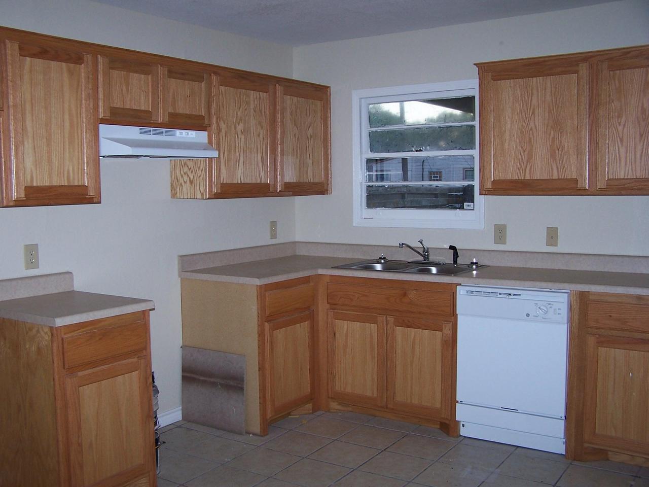 4000 Gables Street Amarillo, TX 79110 - Photo 2 of 4 a kitchen with a sink cabinets and a window