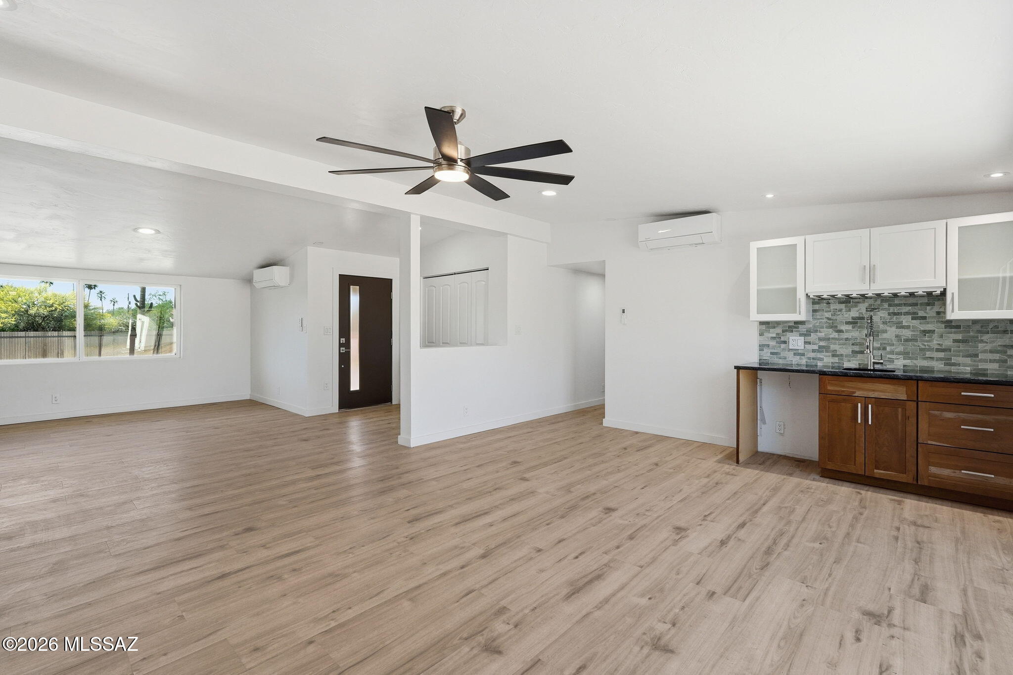 950 West Ina Road Tucson, AZ 85704 - Photo 6 of 54 a view of a kitchen with a sink and cabinet area