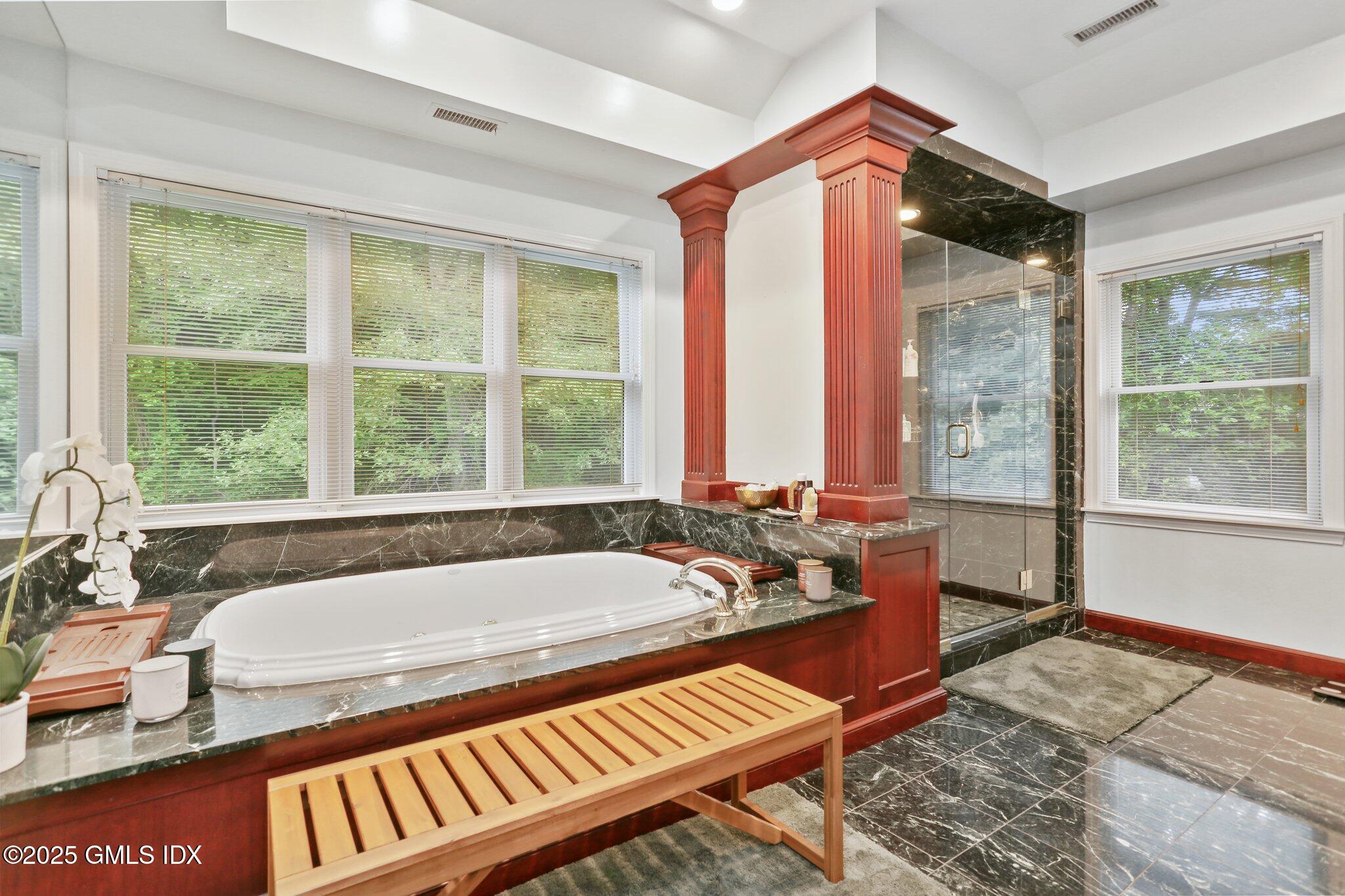 112 Old Belden Hill Road Wilton, CT 06897 - Photo 14 of 38 a bath tub sitting in front of a window