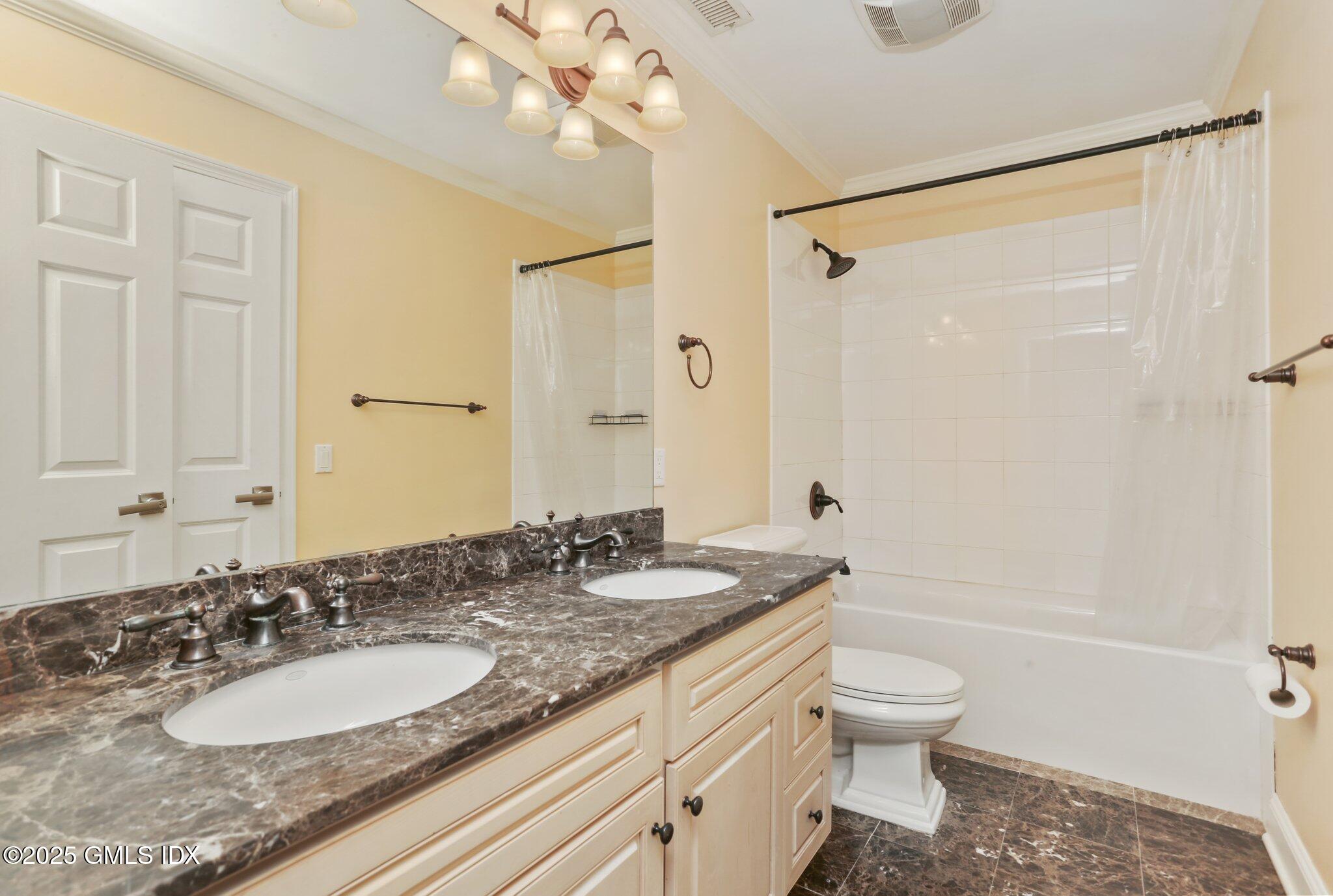 112 Old Belden Hill Road Wilton, CT 06897 - Photo 20 of 38 a bathroom with a granite countertop sink mirror vanity and toilet