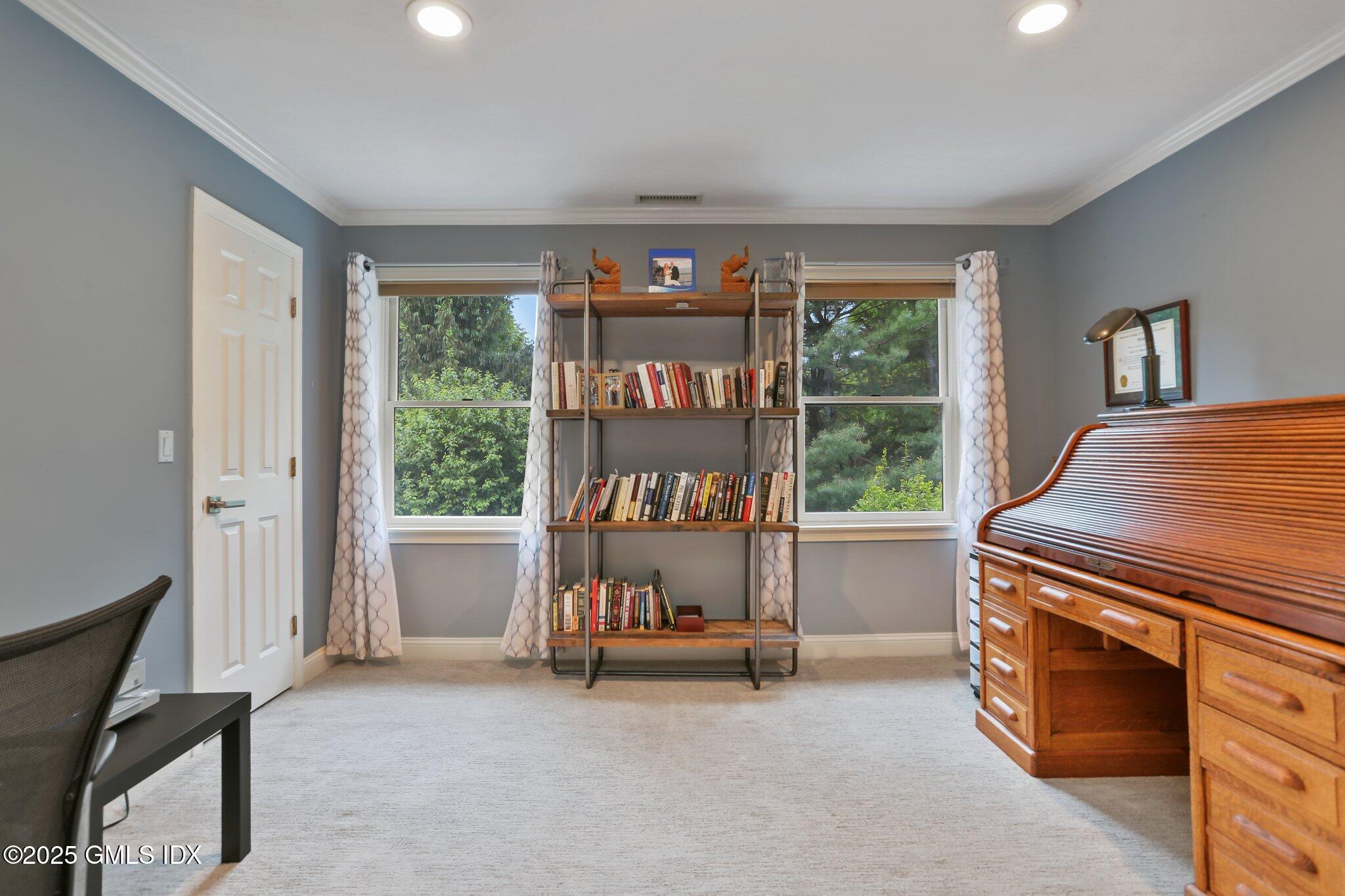 112 Old Belden Hill Road Wilton, CT 06897 - Photo 21 of 38 a bed room with a bed and a window