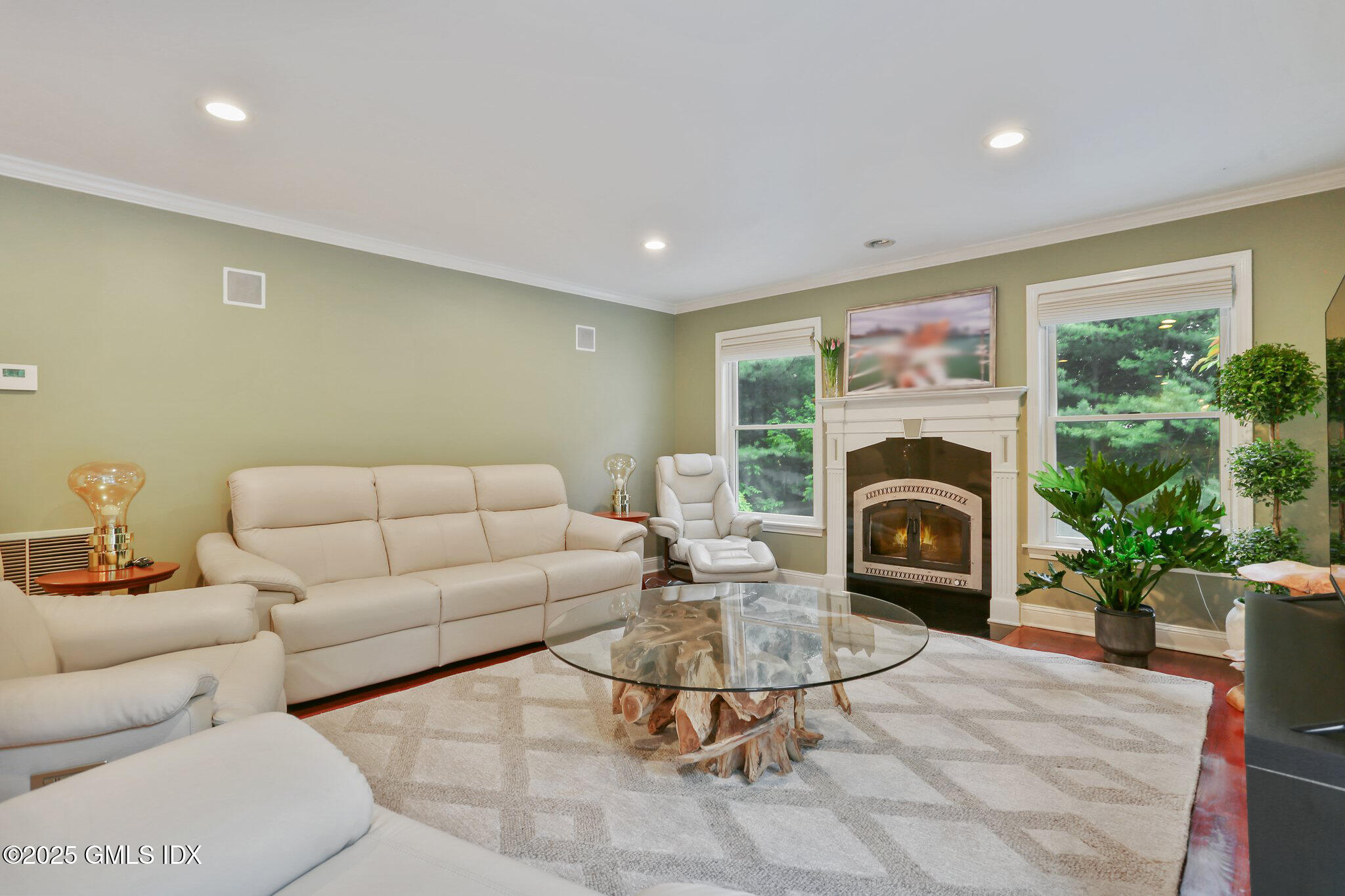 112 Old Belden Hill Road Wilton, CT 06897 - Photo 10 of 38 a living room with furniture and a fireplace