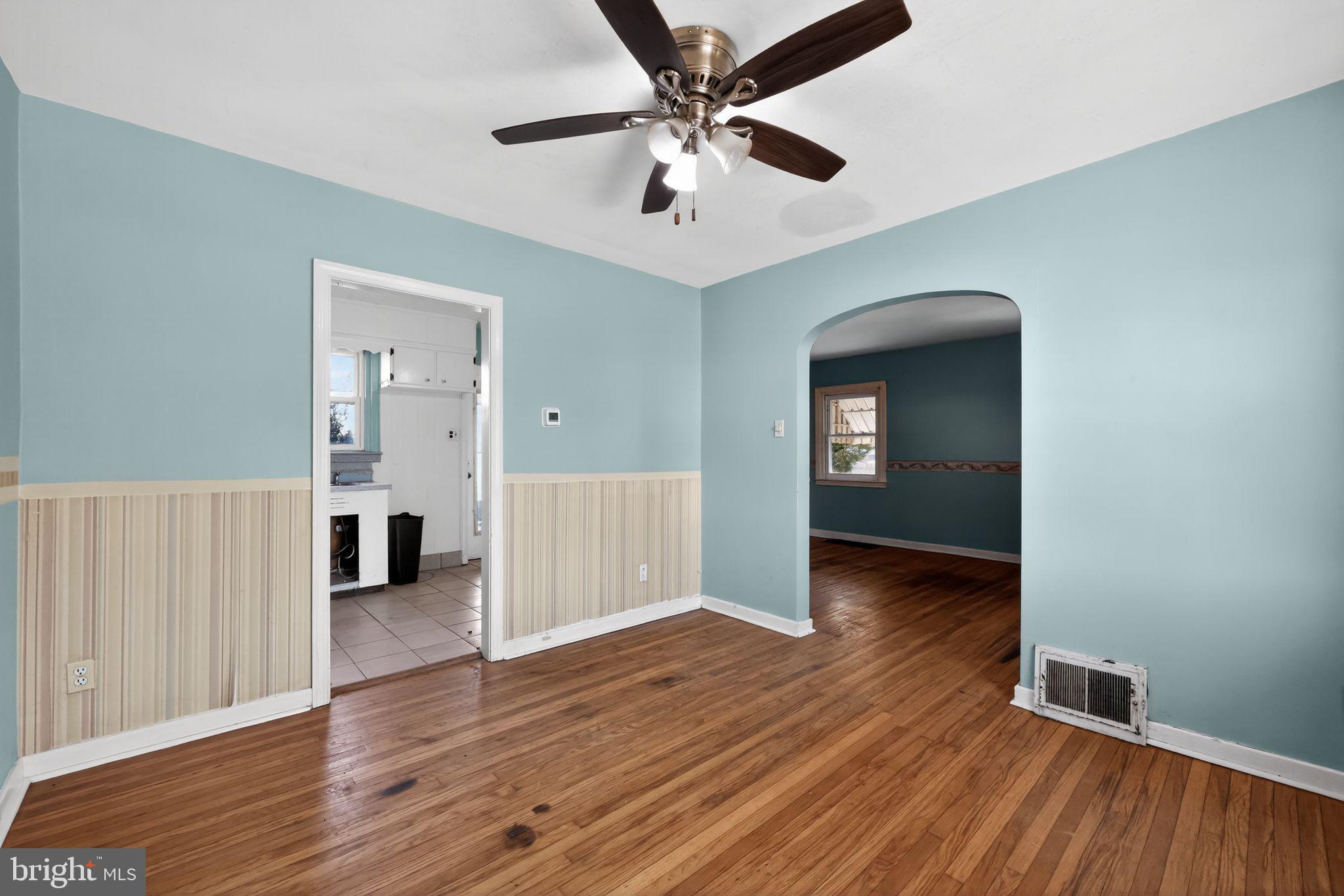 1212 Meadow Road Woodlyn, PA 19094 - Photo 11 of 30 wooden floor in an empty room with a window
