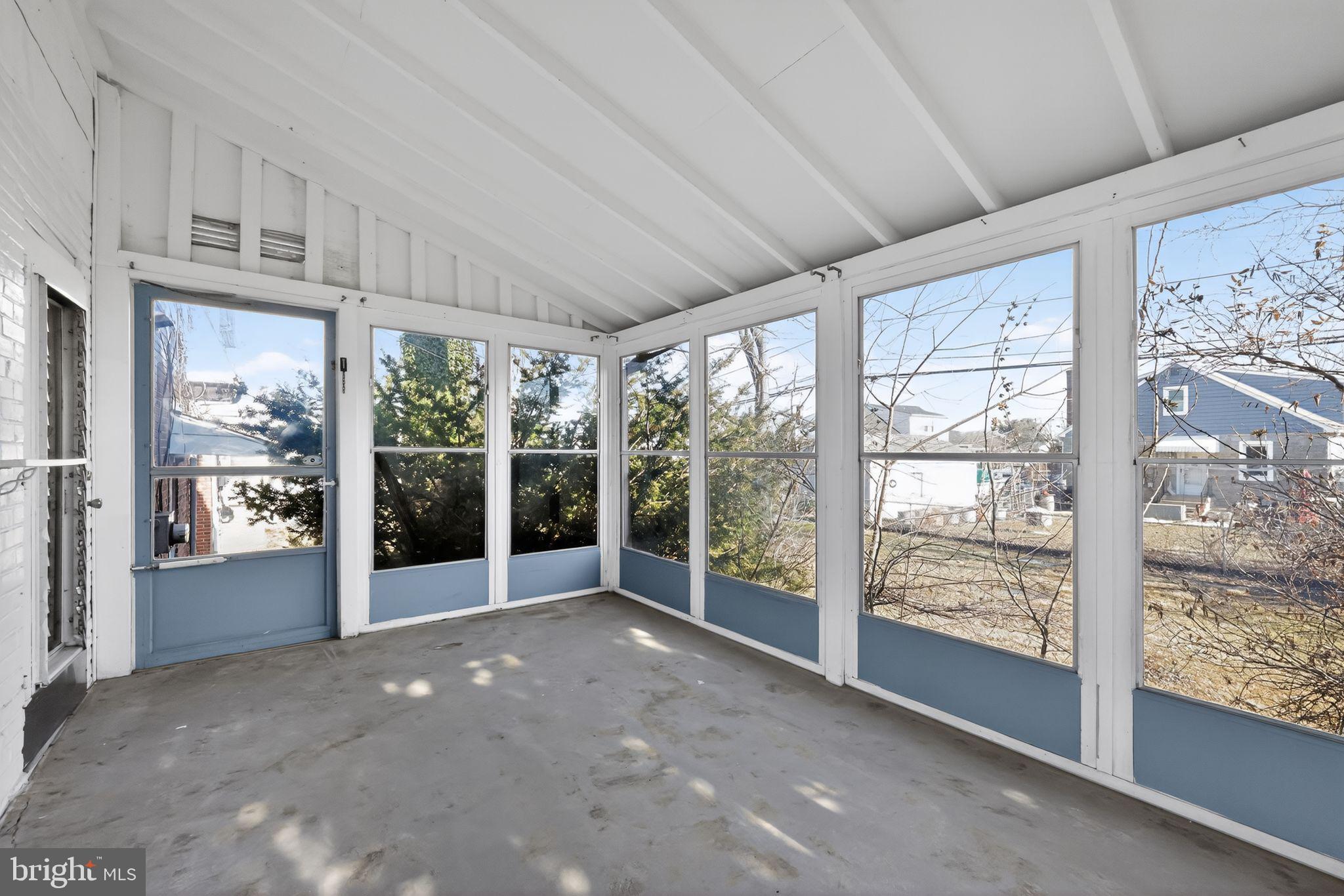 1212 Meadow Road Woodlyn, PA 19094 - Photo 18 of 30 a view of a room with sliding glass door