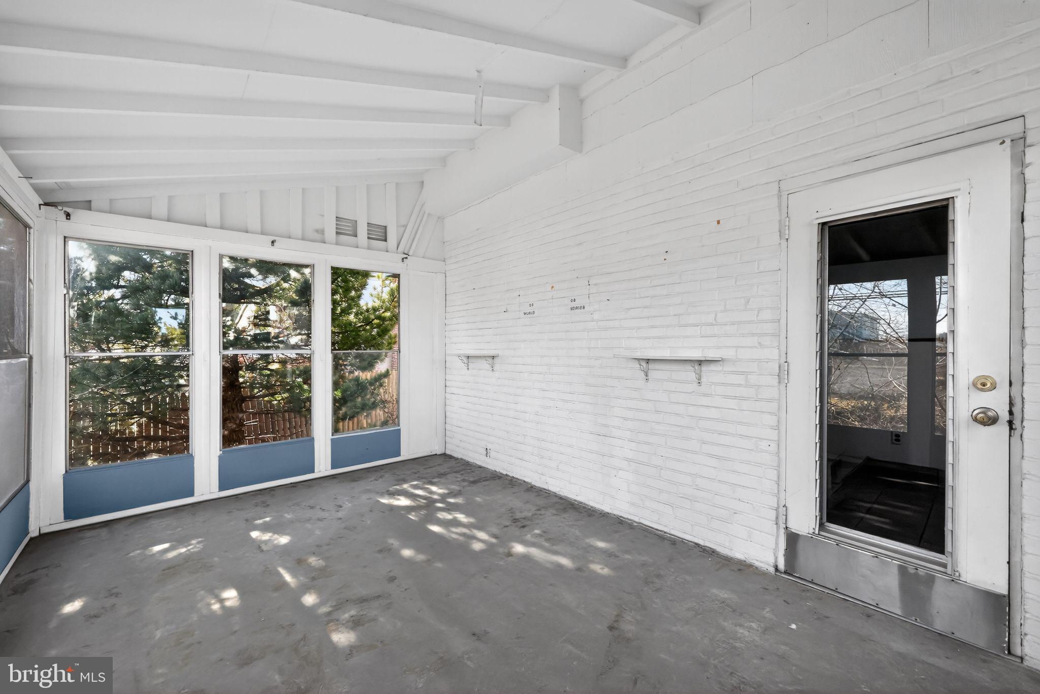 1212 Meadow Road Woodlyn, PA 19094 - Photo 19 of 30 wooden floor and window in an empty room