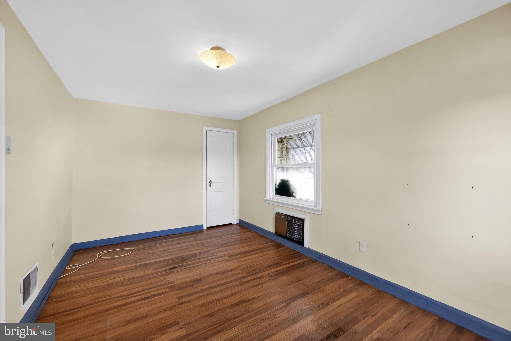 1212 Meadow Road Woodlyn, PA 19094 - Photo 21 of 30 a view of empty room with wooden floor and fan