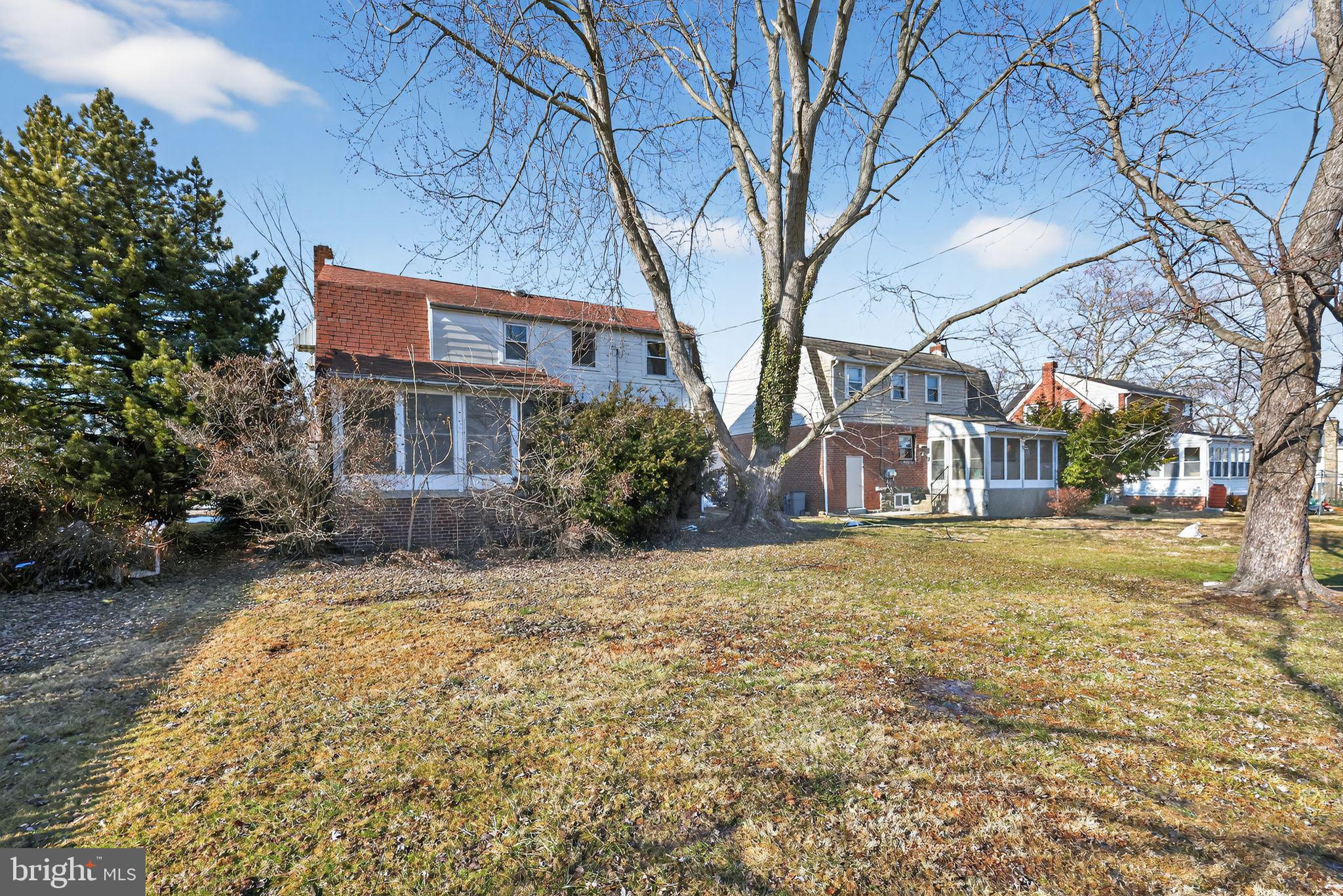 1212 Meadow Road Woodlyn, PA 19094 - Photo 29 of 30 a front view of house with a garden