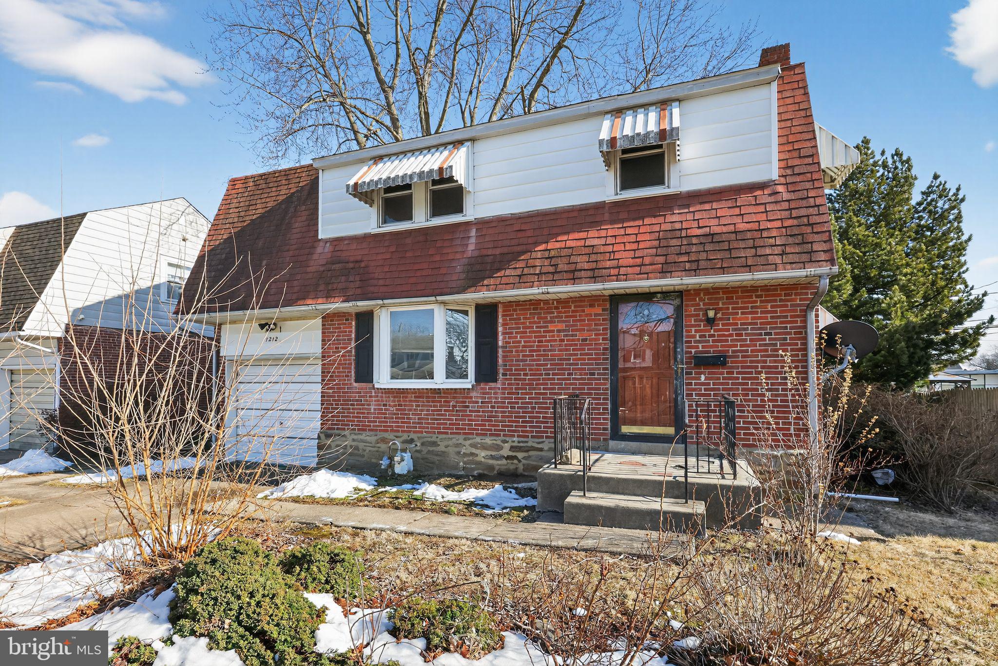 1212 Meadow Road Woodlyn, PA 19094 - Photo 3 of 30 a front view of a house