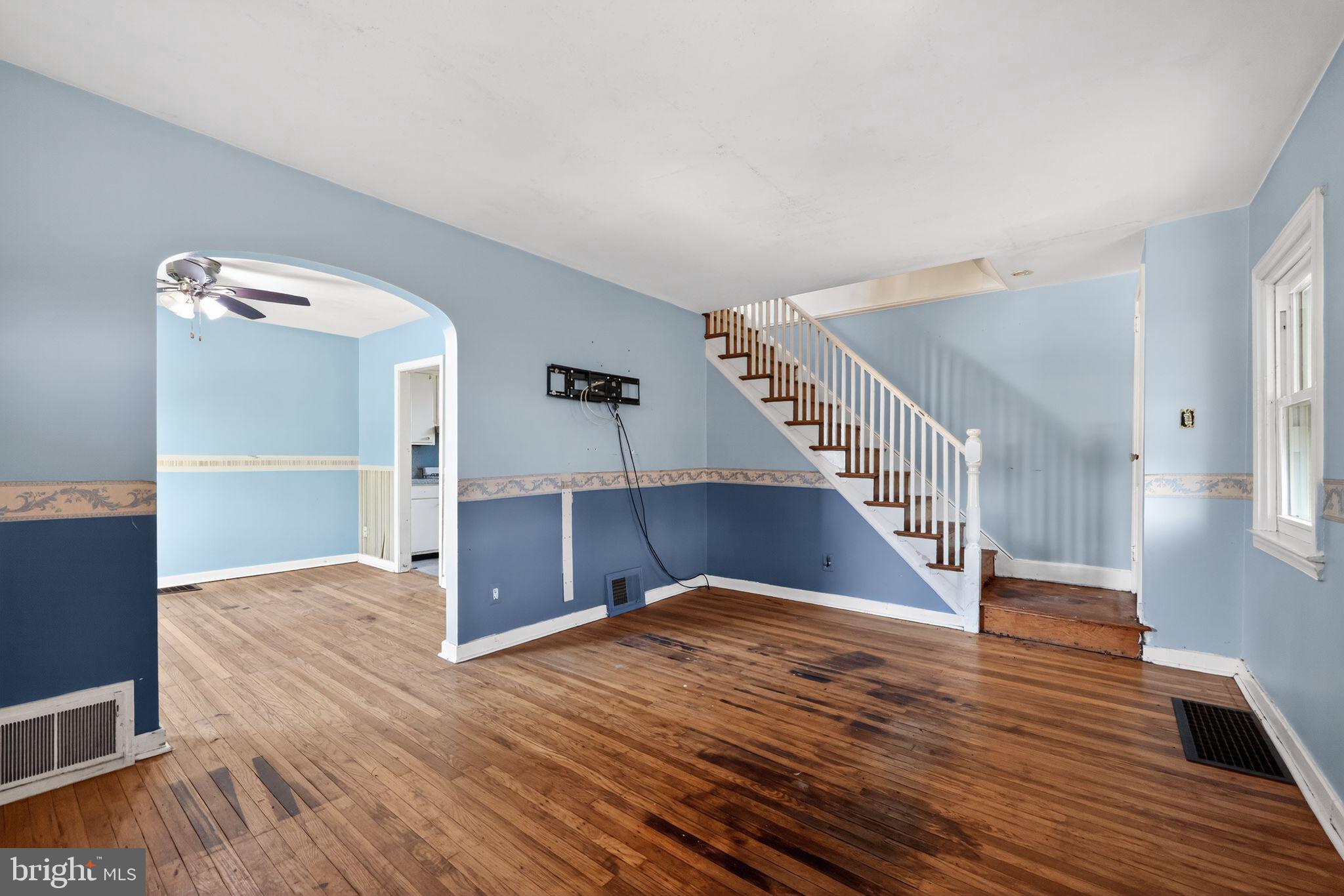 1212 Meadow Road Woodlyn, PA 19094 - Photo 8 of 30 a view of entryway and hall with wooden floor