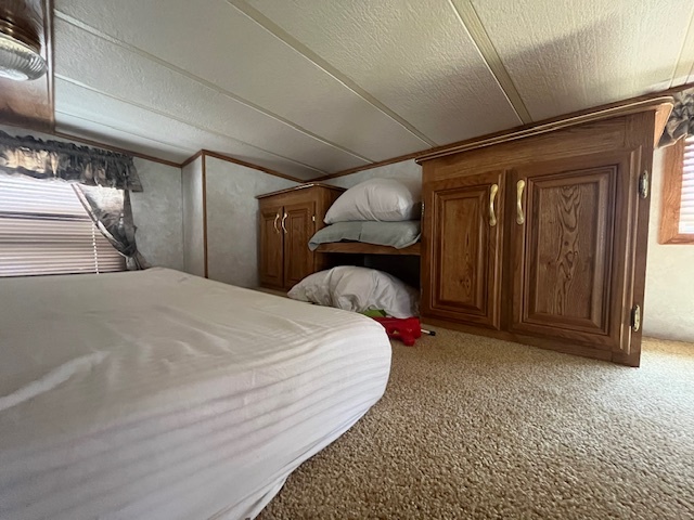 2795 East 28th Road Marseilles, IL 61341 - Photo 21 of 66 a bed sitting in a bedroom next to a window