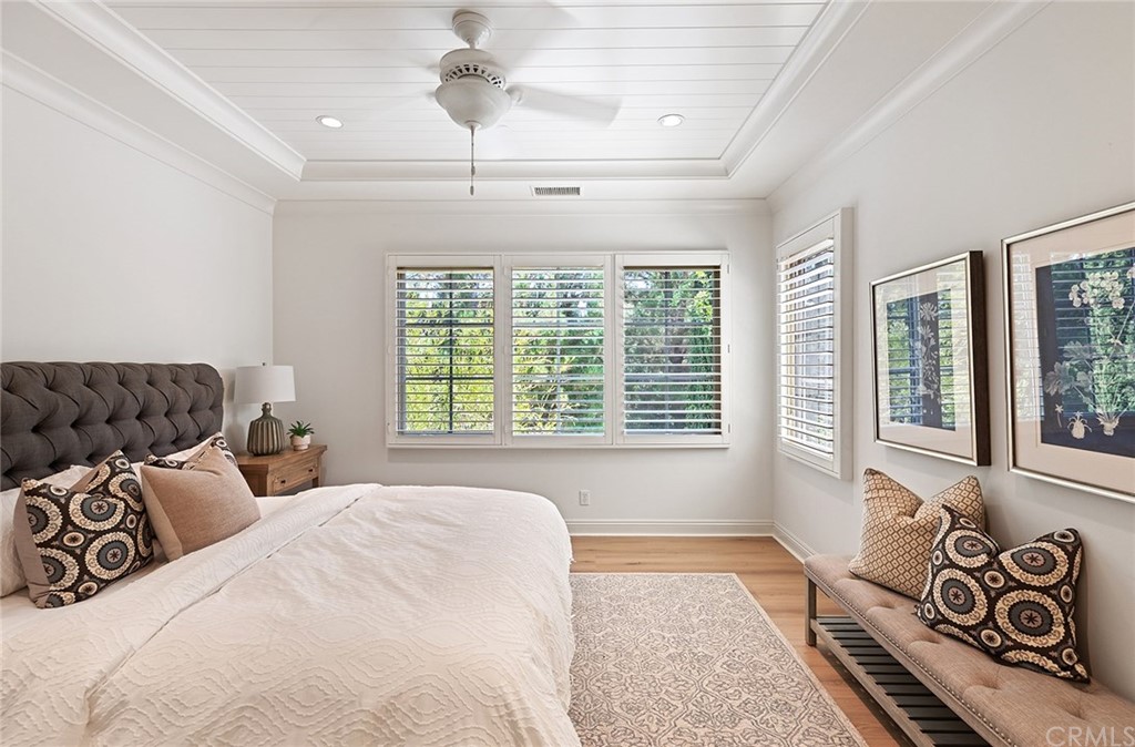 62 Cipresso Irvine, CA 92618 - Photo 13 of 49 a bedroom with a large bed and a window