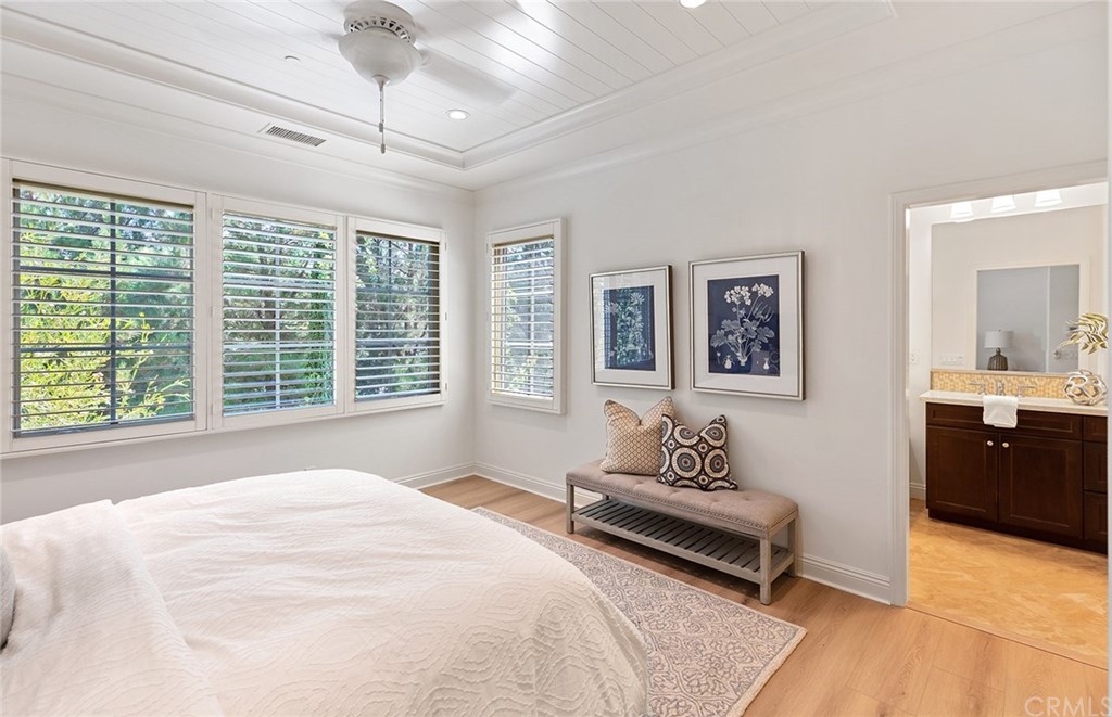 62 Cipresso Irvine, CA 92618 - Photo 14 of 49 a bedroom with a bed furniture and a window