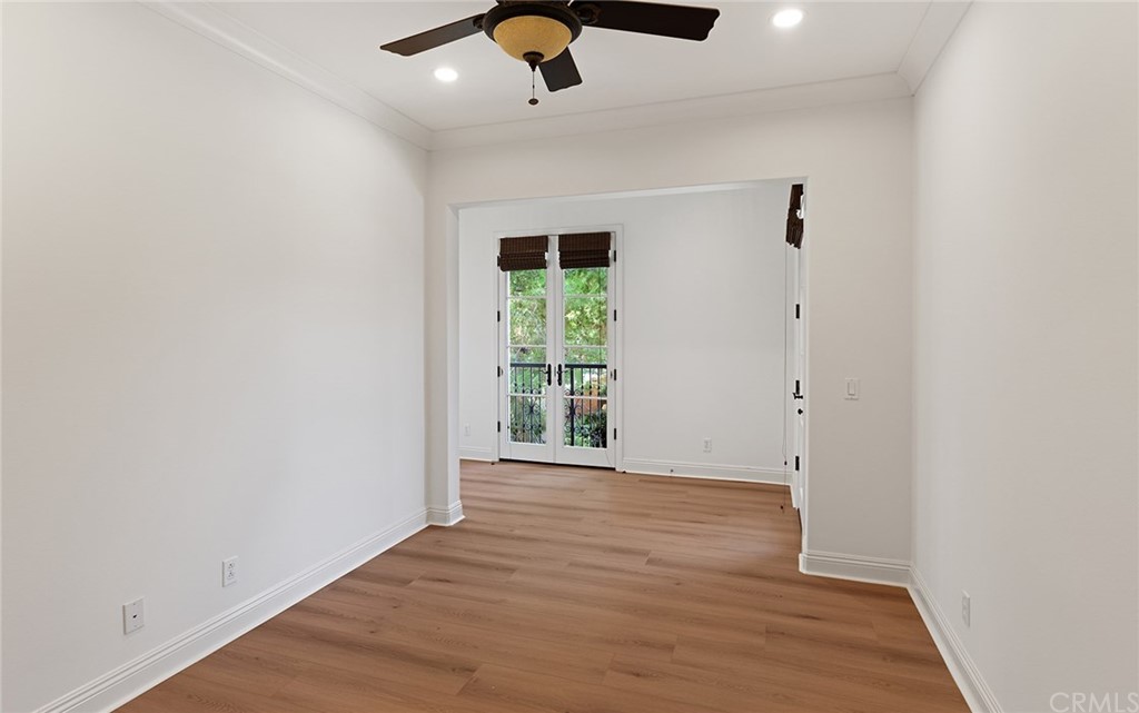 62 Cipresso Irvine, CA 92618 - Photo 18 of 49 wooden floor in an empty room with a window