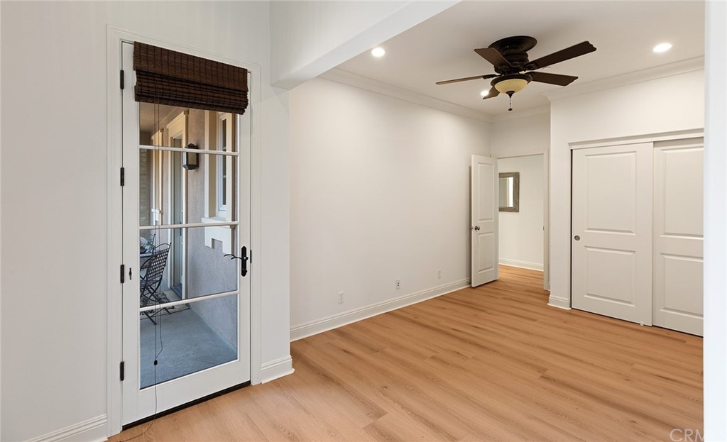 62 Cipresso Irvine, CA 92618 - Photo 19 of 49 wooden floor in an empty room with a window