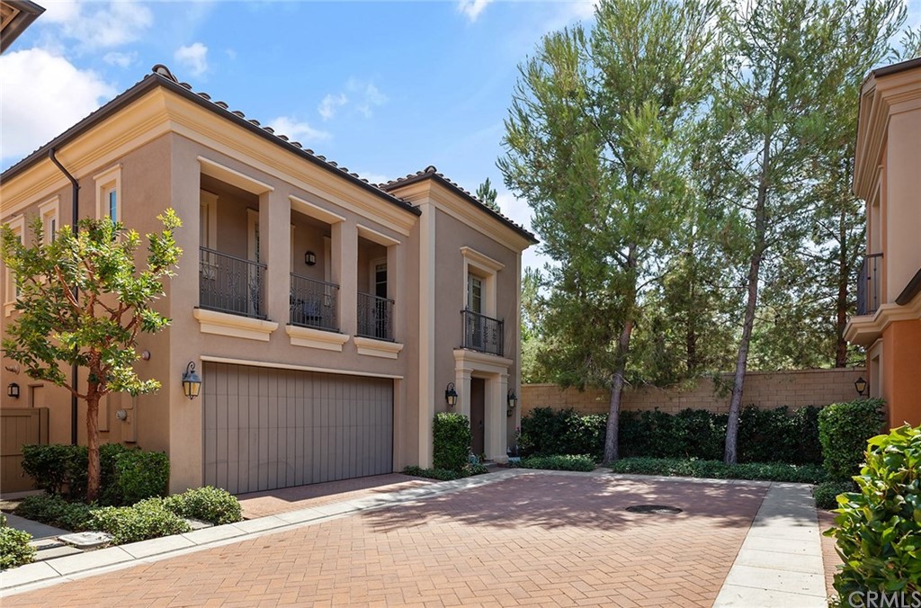 62 Cipresso Irvine, CA 92618 - Photo 2 of 49 a front view of a house with a yard